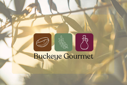 Buckye Gourmet logo in front of leaves