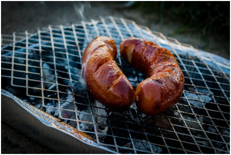 Grilled Sausages with Basil Olive Sauce