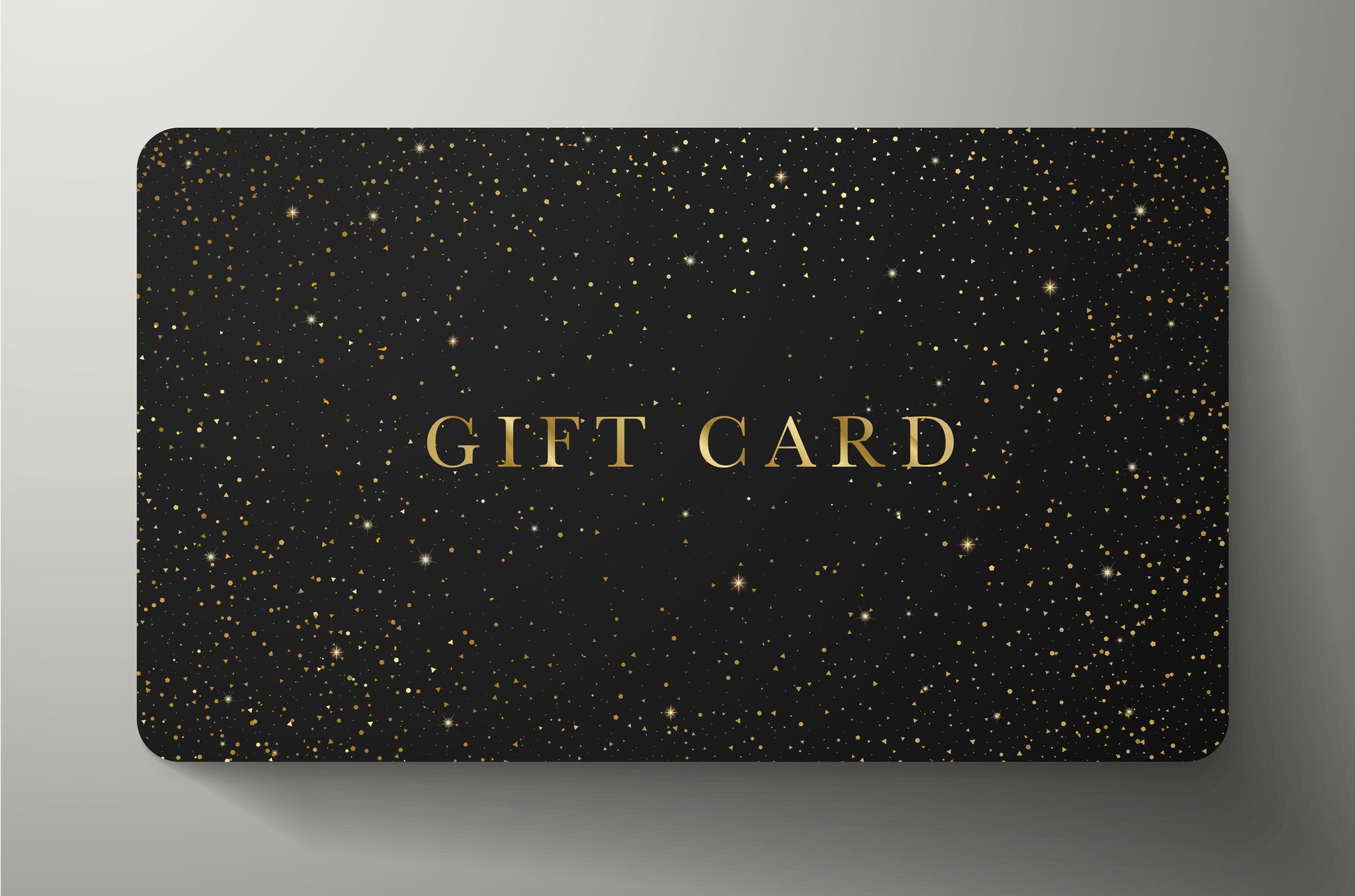 Black gift card with gold text on a gray background